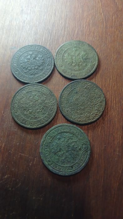 П'ять монет 1 копійка.