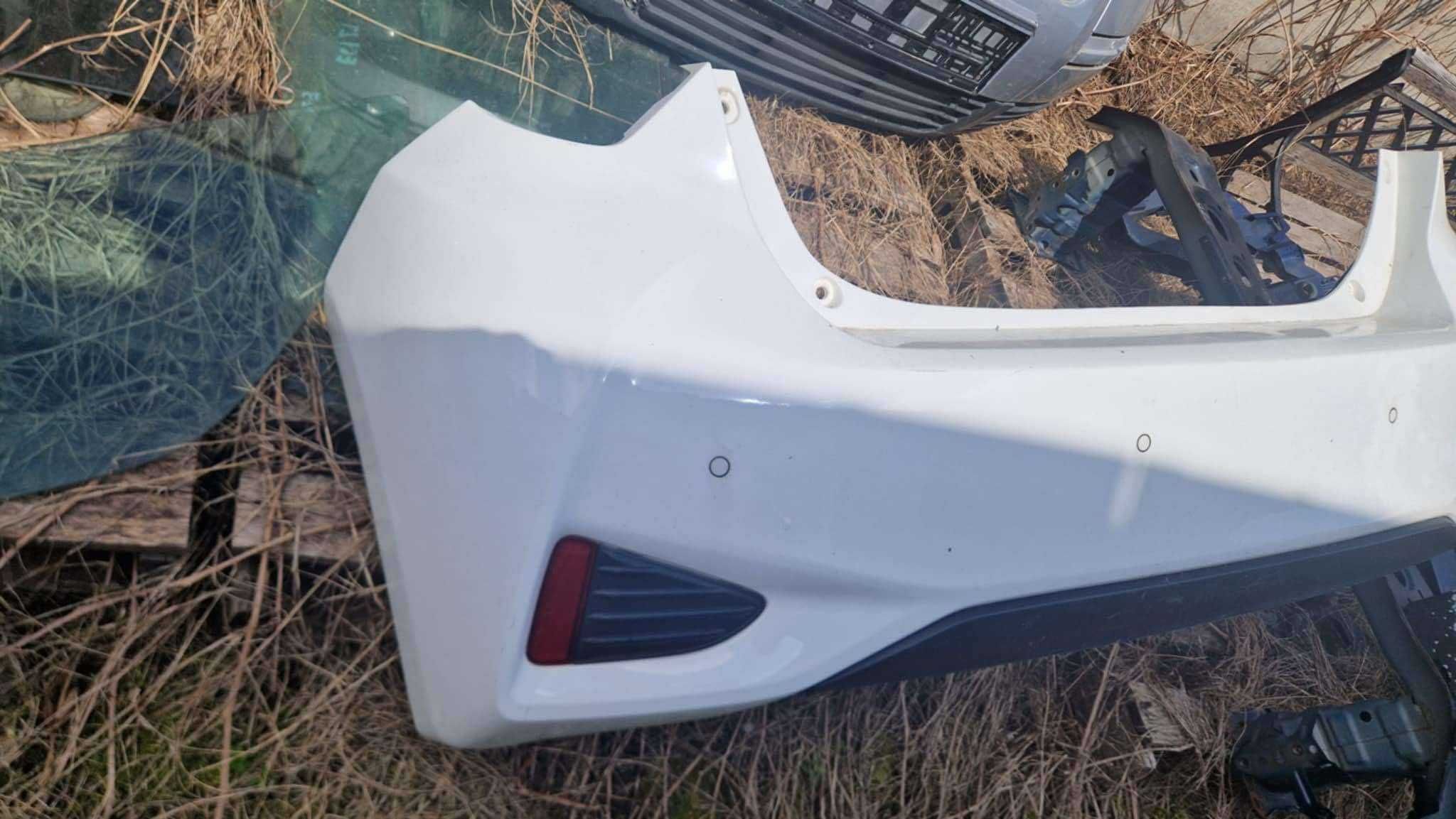 Zderzak tył toyota yaris III hybryda kolor 040