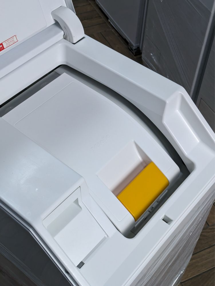 Пральна машина в верхнім завантаженням Miele W668