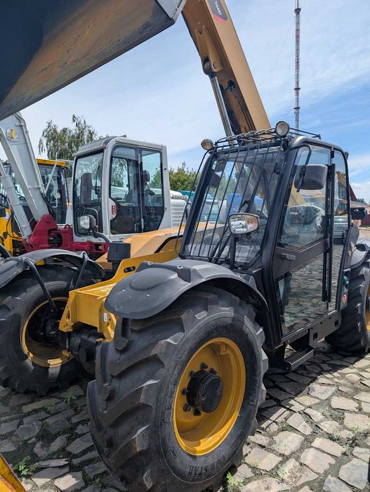 Навантажувач телескопічний Caterpillar TH 407 (JCB 541-70 AGRI)