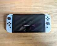 Switch OLED + etui + neogrip - stan BDB
