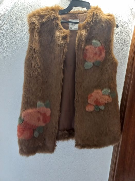 Elegante colete de pêlo para menina