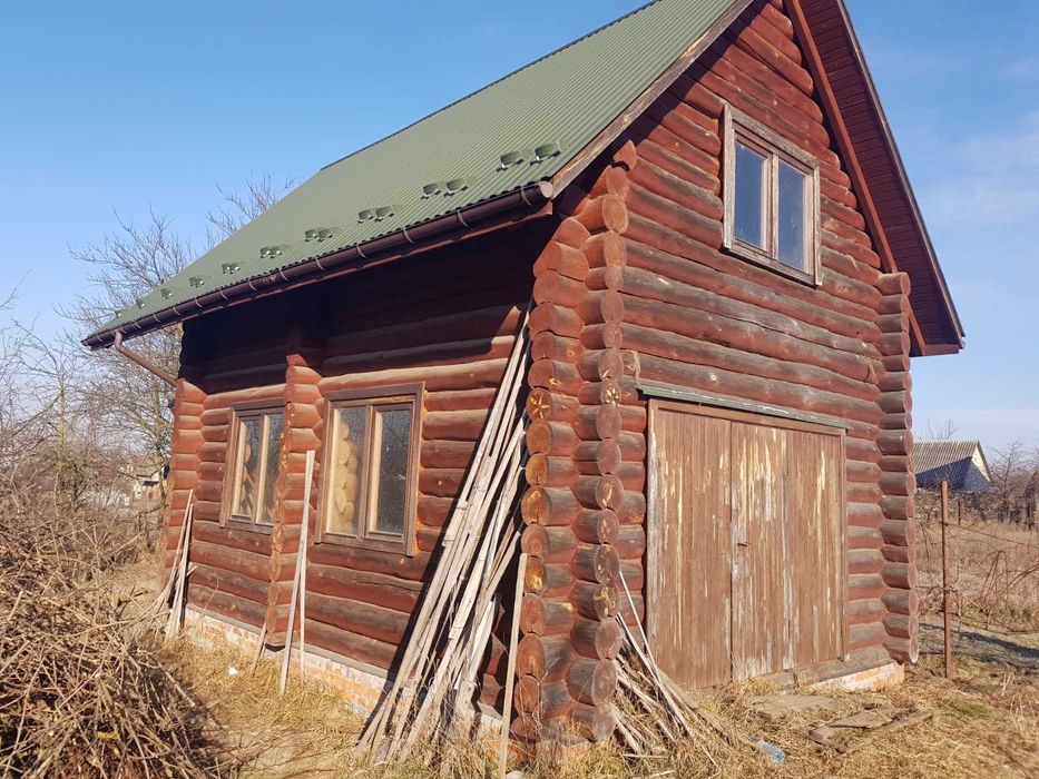 Будиночок зі зрубу та земельна ділянка 15 сот. с. Забужжя