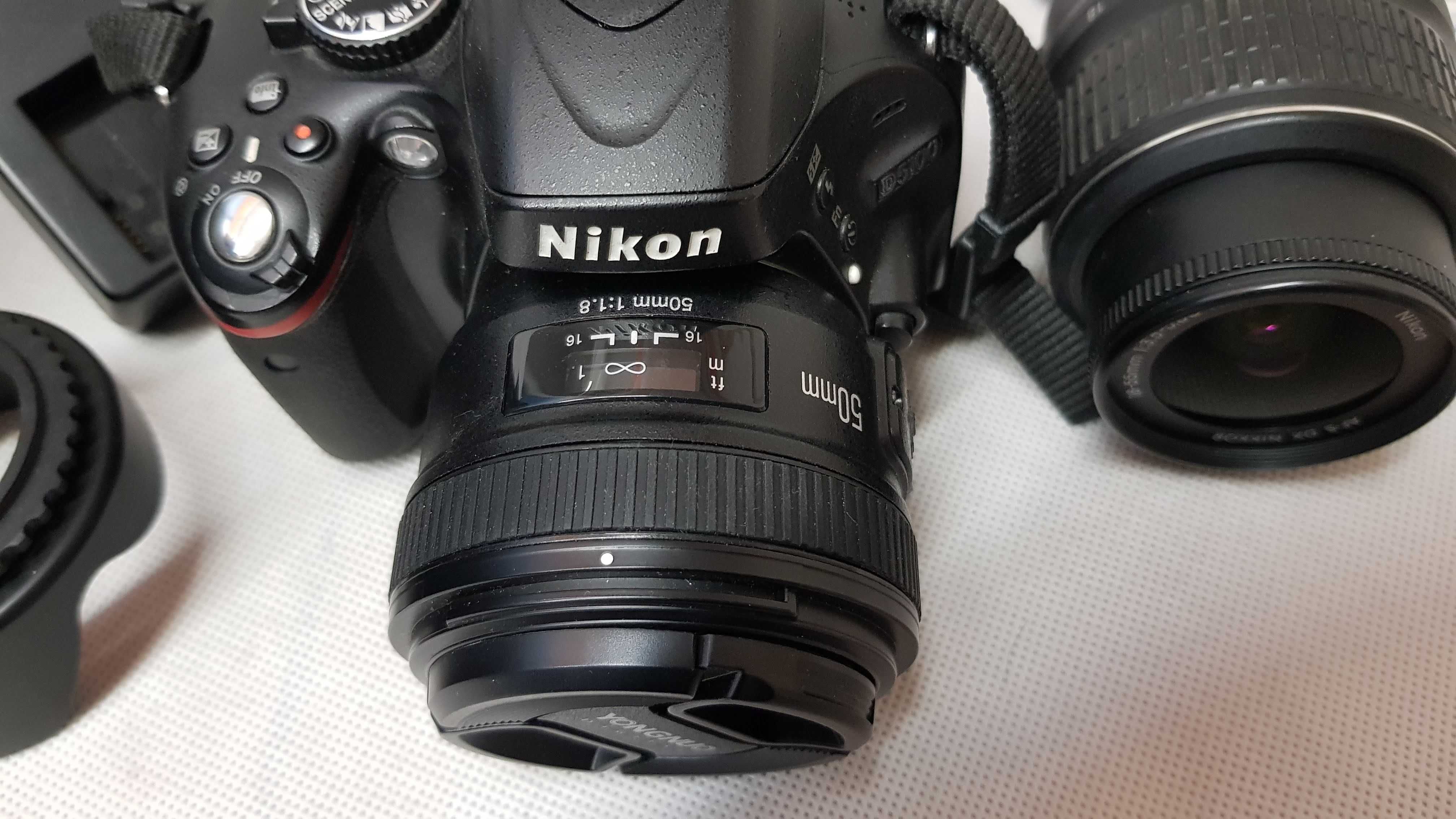 Aparat Nikon D5100, dwa obiektywy, lampa, i inne