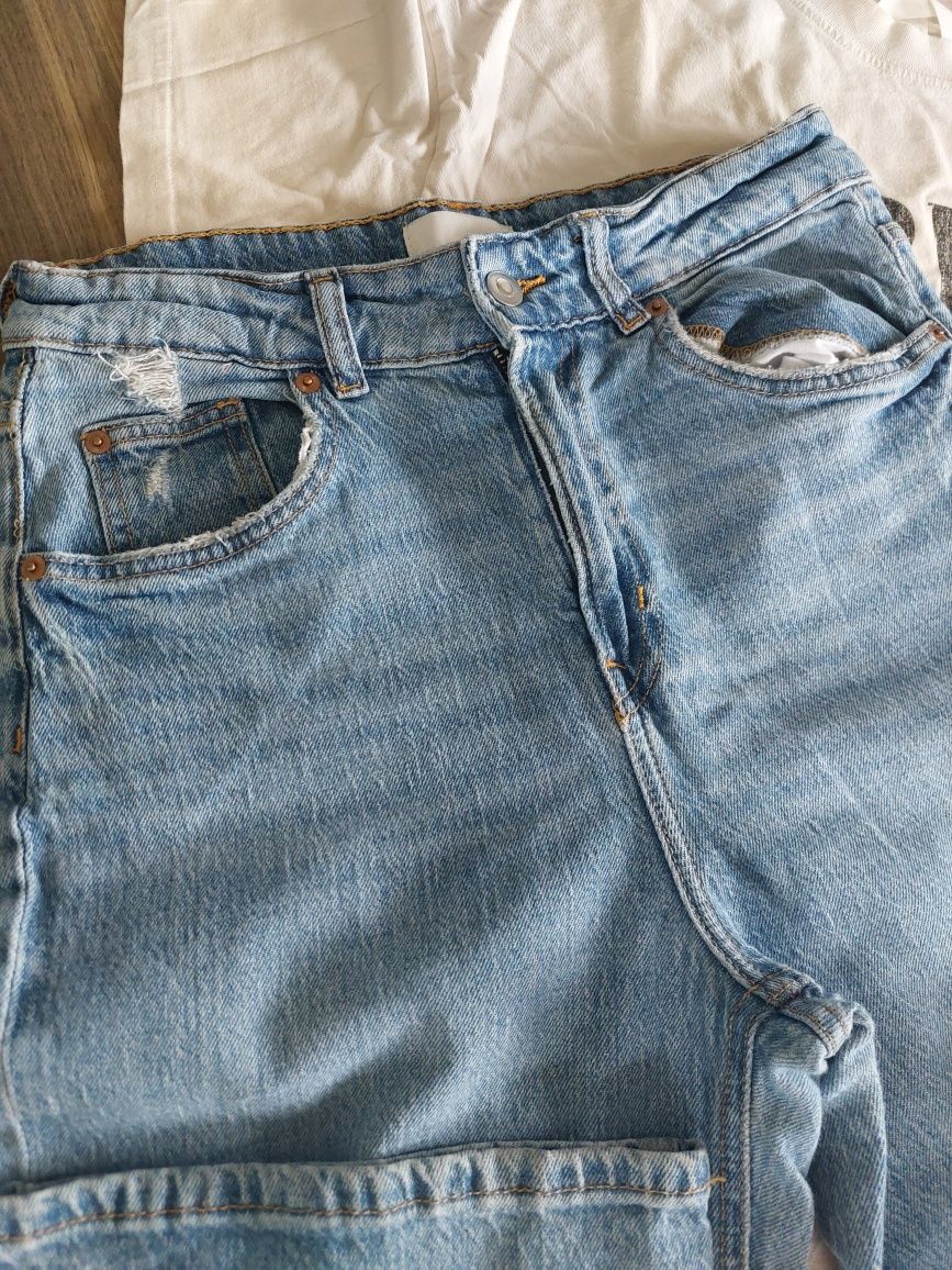 Spodnie jeansowe damskie wysoki stan, poszerzane nogawki rozm 40