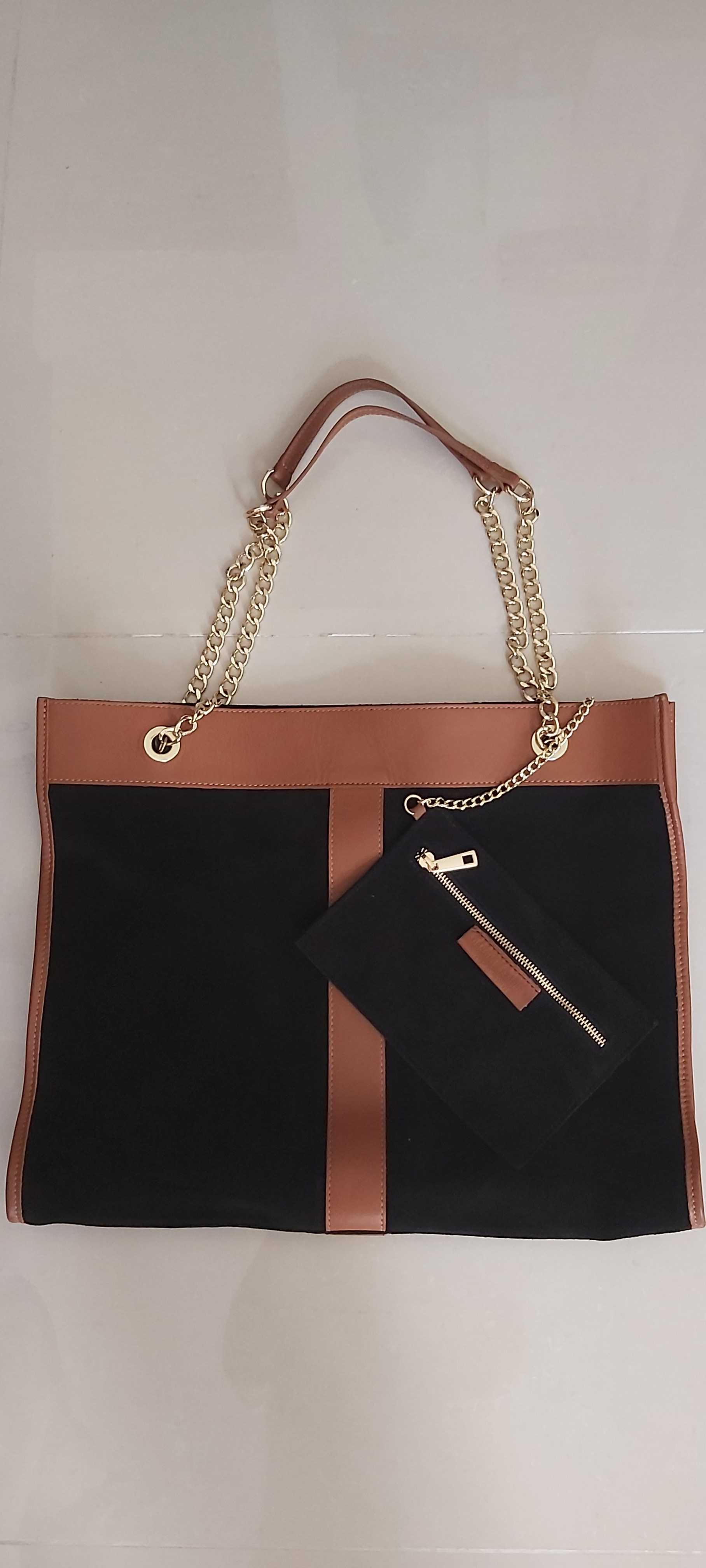 Mala shopper em pele genuína(preto e camel). Marca "Eureka"