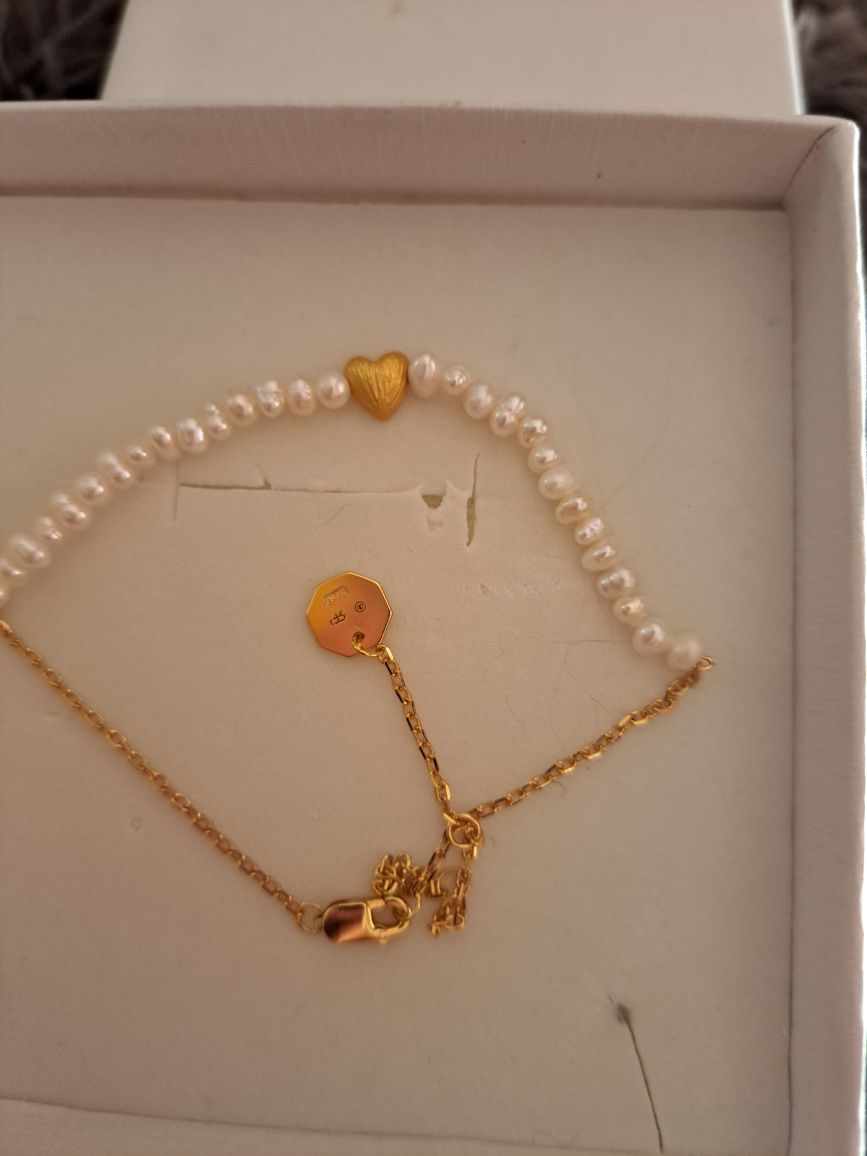 Pulseira em prata dourada