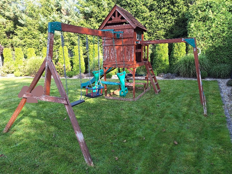 Duży drewniany plac zabaw zjeżdżalnia domek huśtawki