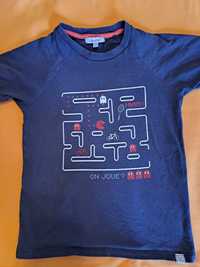 T-shirt azul escura da absorba
Tamanho 6anos 
Estampagem do pac-man