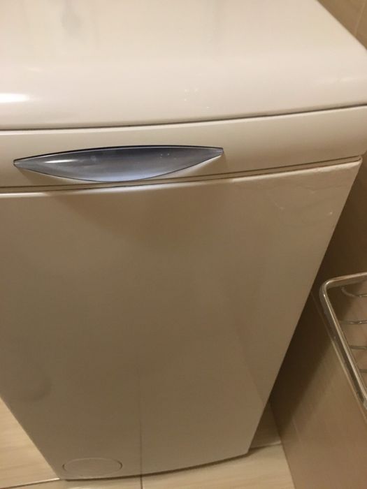 Пральна машинка Whirlpool вертикальна