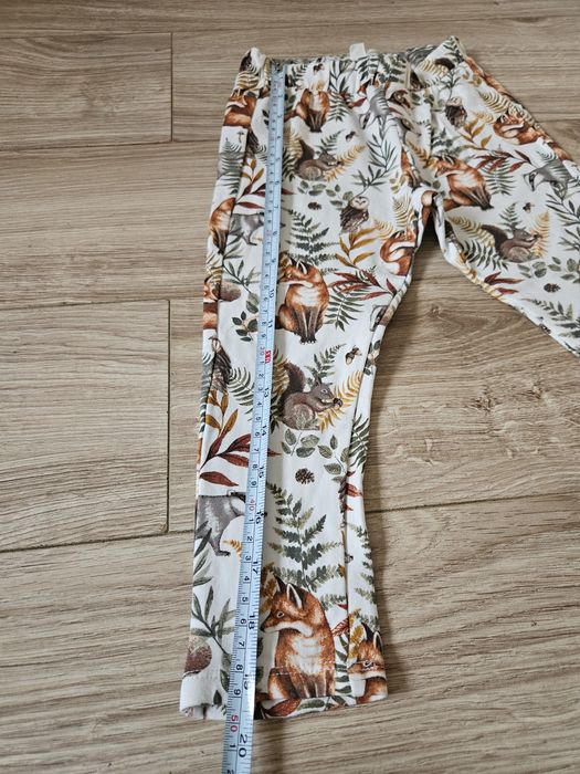 Spodnie newbie jesienne wzory lekko ocieplane liście leśne zwierzątka