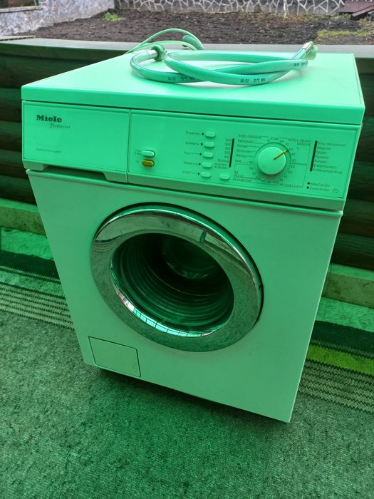 Міле машинка -автомат.