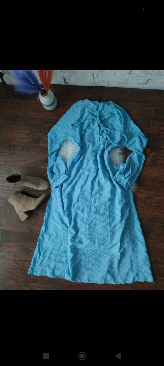 Maxi Baby blue sukienka Pastela Boho wiązanie
Rozmiar L