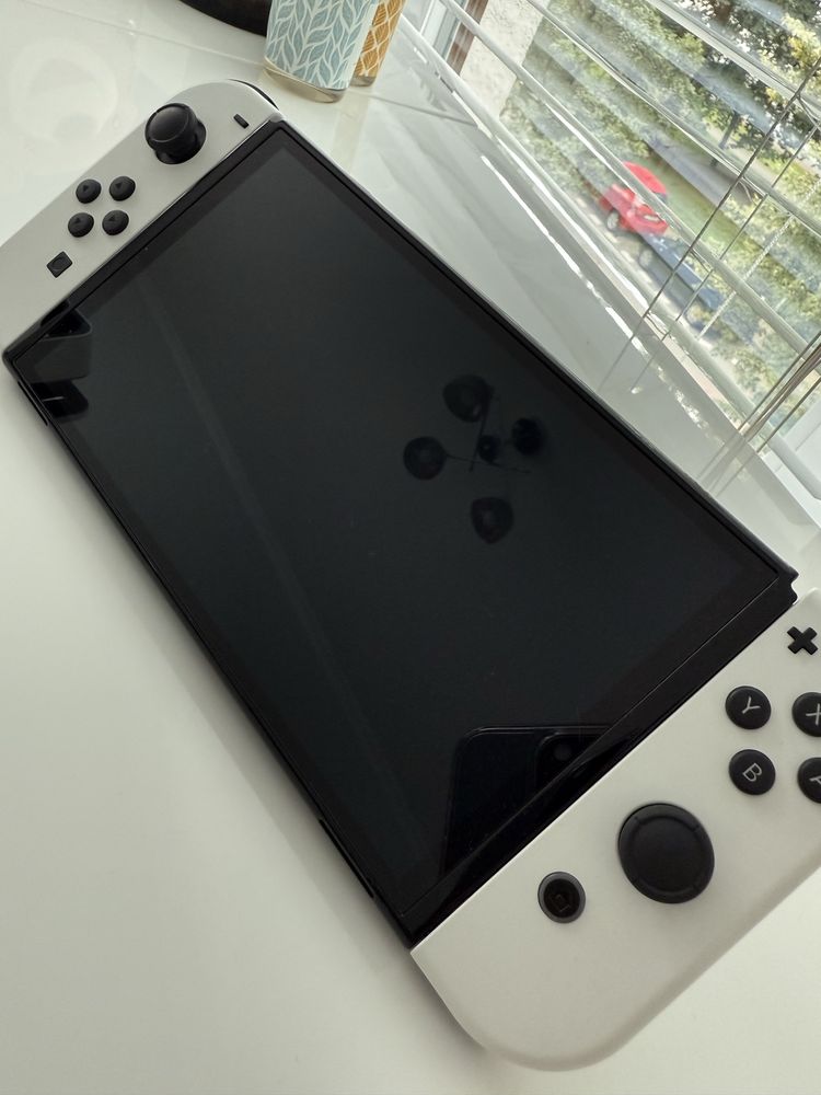 Nintendo Switch OLED + dodatkowe Joycon i gry