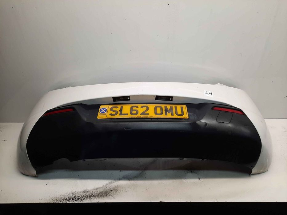 } ZDERZAK TYŁ TYLNY OPEL ASTRA J 4 IV GTC Z40R BIAŁY