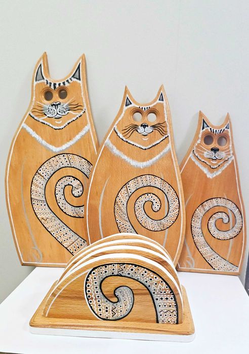 Na prezent koty na deskach