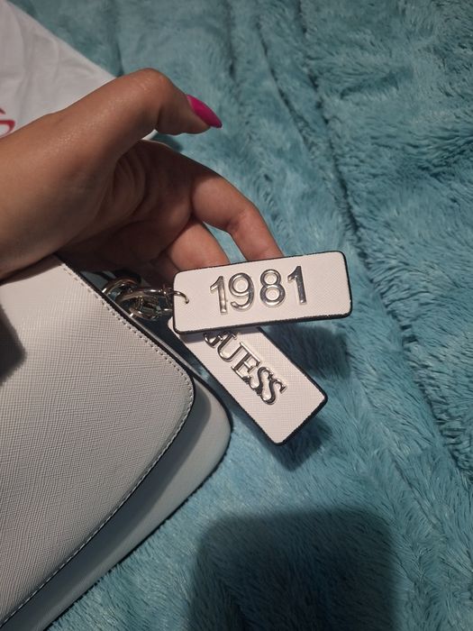 Mala Guess como nova