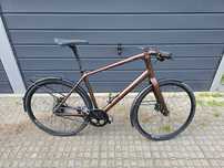 Canyon Commuter 8.0 - miejski rower na pasku Gates + Shimano Alifio