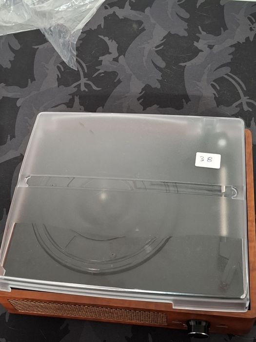 Gira discos com tampa danificada