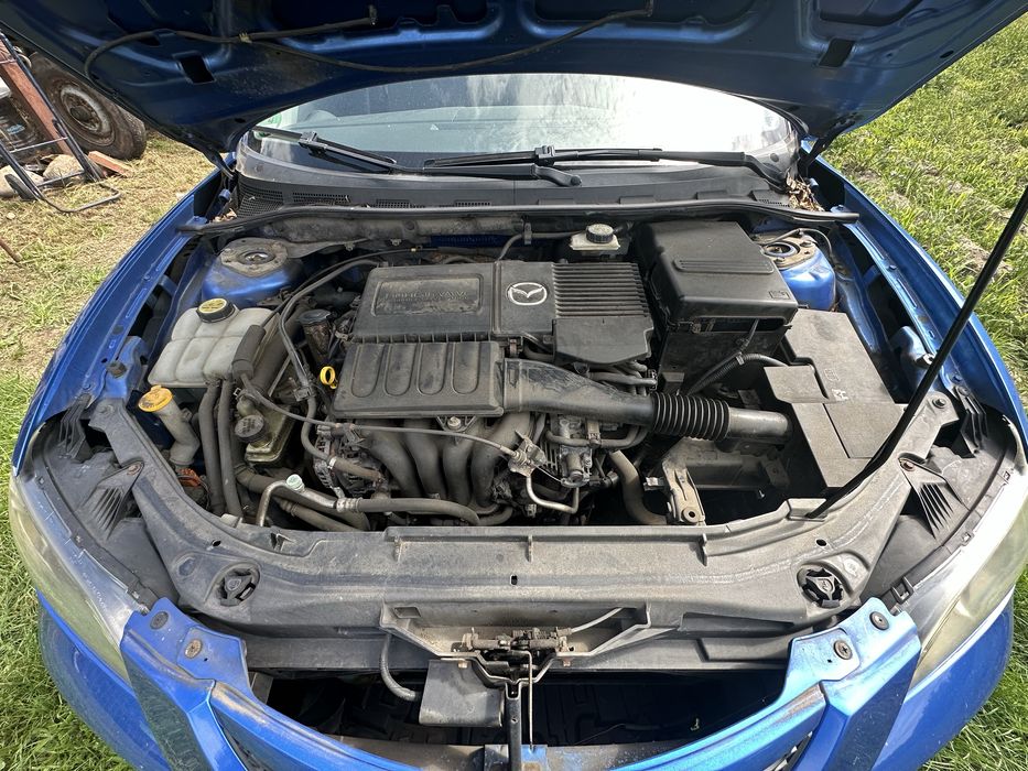 Mazda 3-/ мотор 1.6 бензин/ капот / з Німеччини / фара