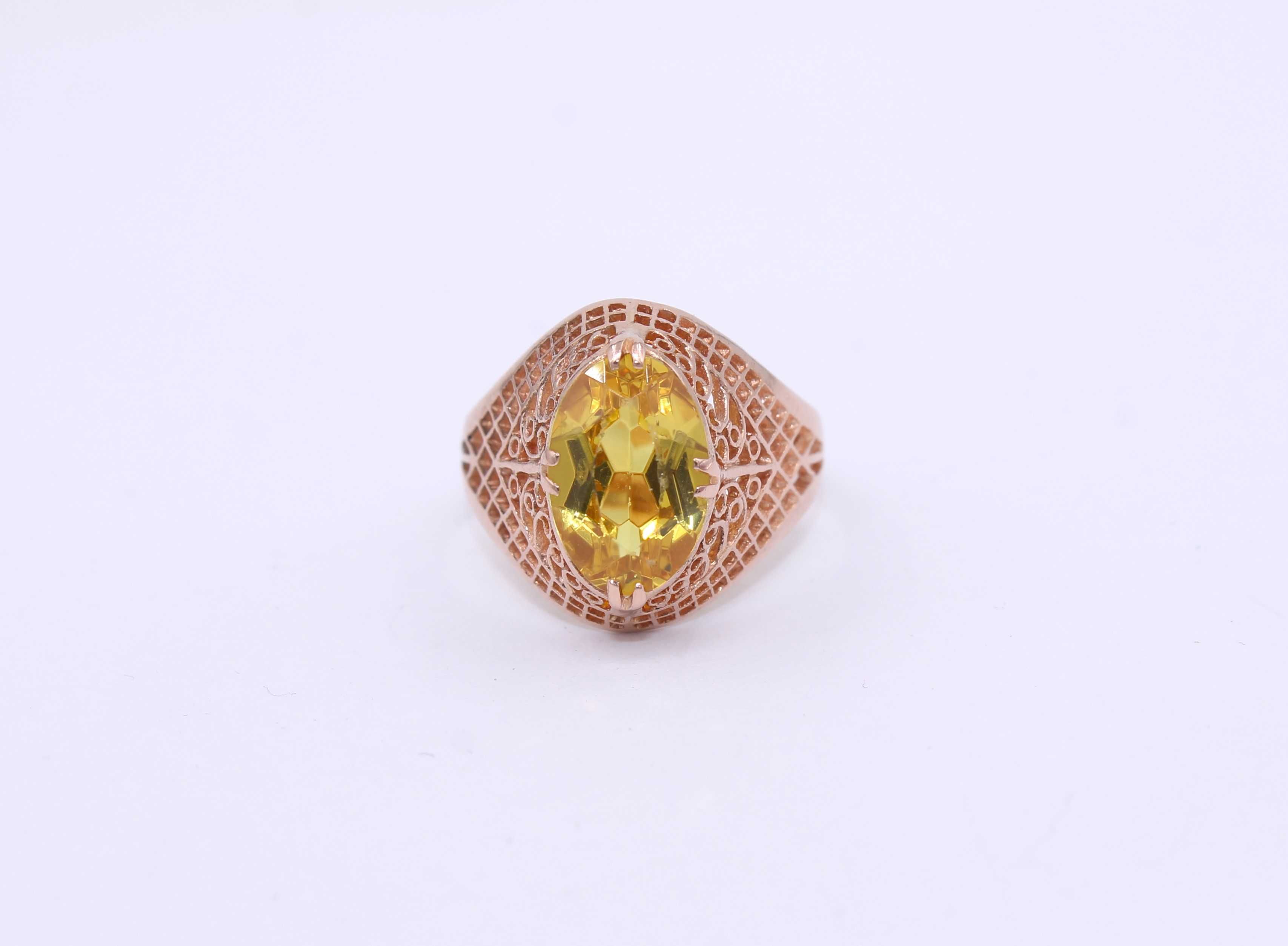Złoty pierścionek p.585/3.65g z żółtym kamieniem