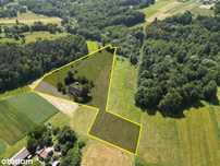 Grunt z zabudową | 2,4 ha | Wysoka | Możliwość prz