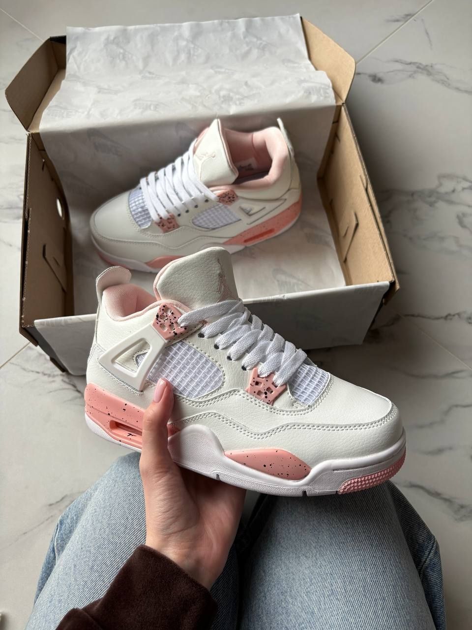 Jordan 4 персикові та фіолетові