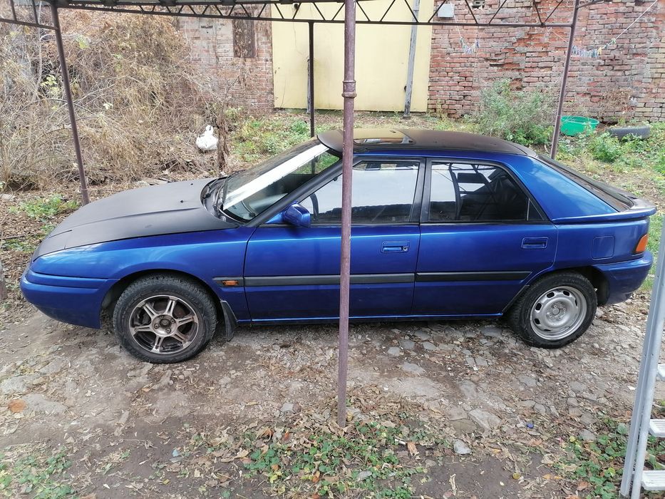 Мазда - 323  Сліпа 1.6-16v