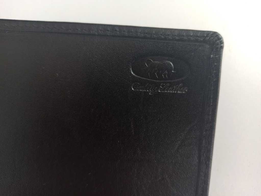 Кожаный кошелёк Quality Leather  21*10 см має дефект підкладки