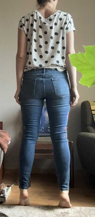 Джинси з вишивкою квітів вузькі