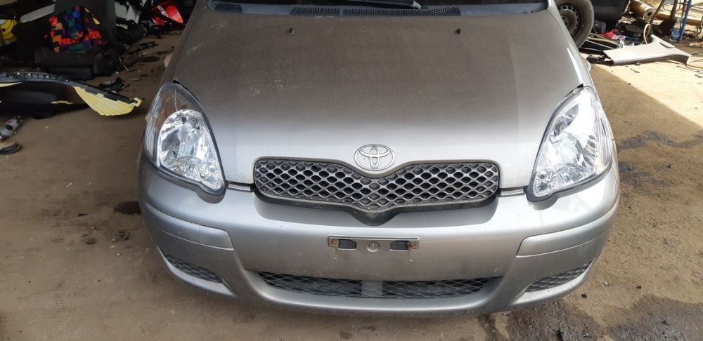 Na części Toyota Yaris I 1D2 Silnik Skrzynia Maska Zderzak Drzwi Klapa Szyba