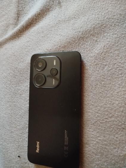 Redmi nout 14 syn dobry