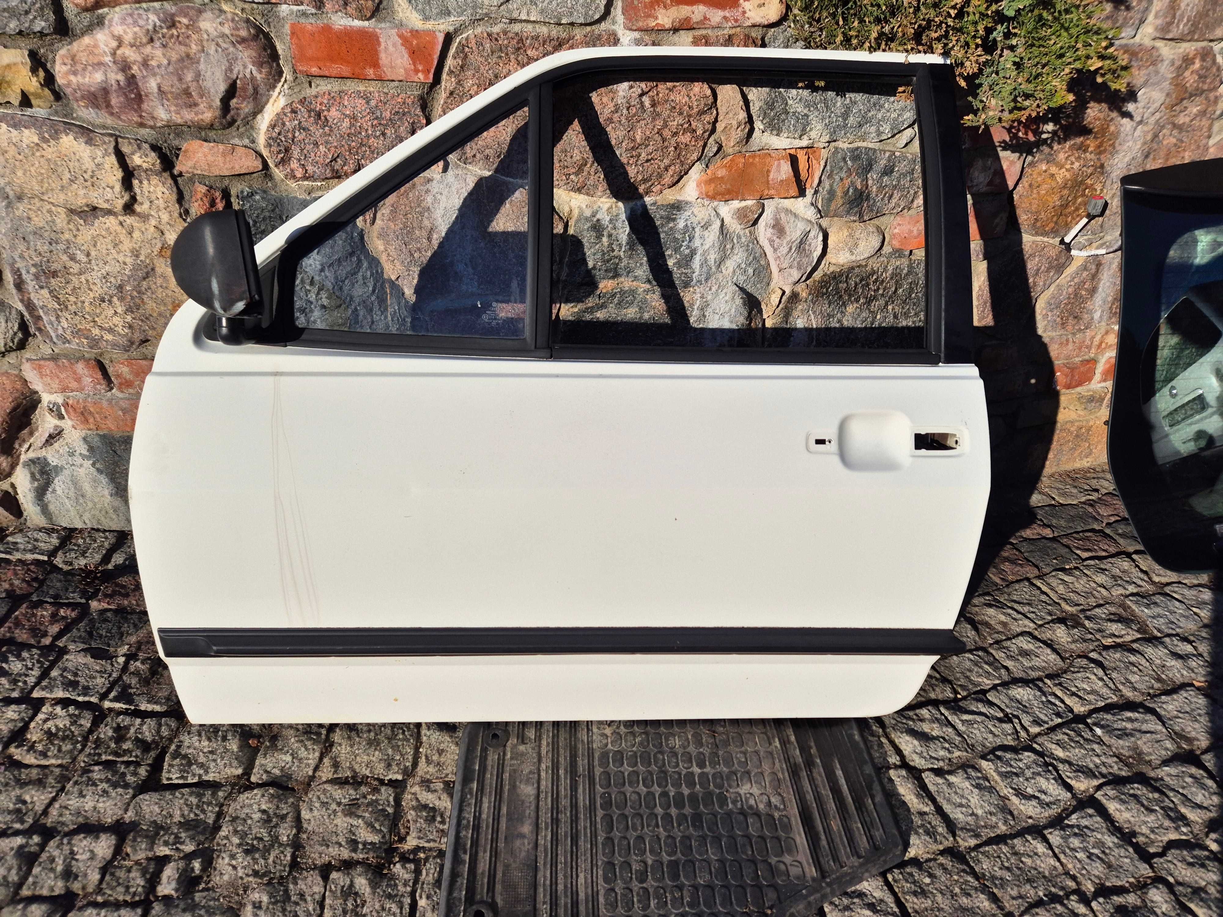 drzwi przednie lewe lewy przód vw polo II coupe 3 drzwi oryginał igła