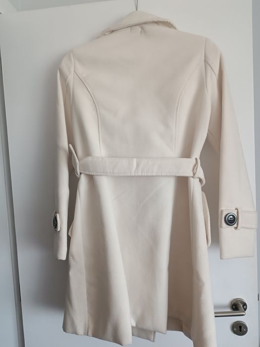 Casaco comprido branco
Em ótim