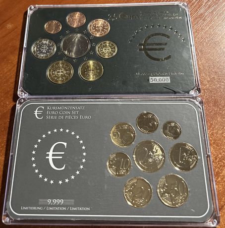 Наборы памятных монет евро Португалии и Латвии.