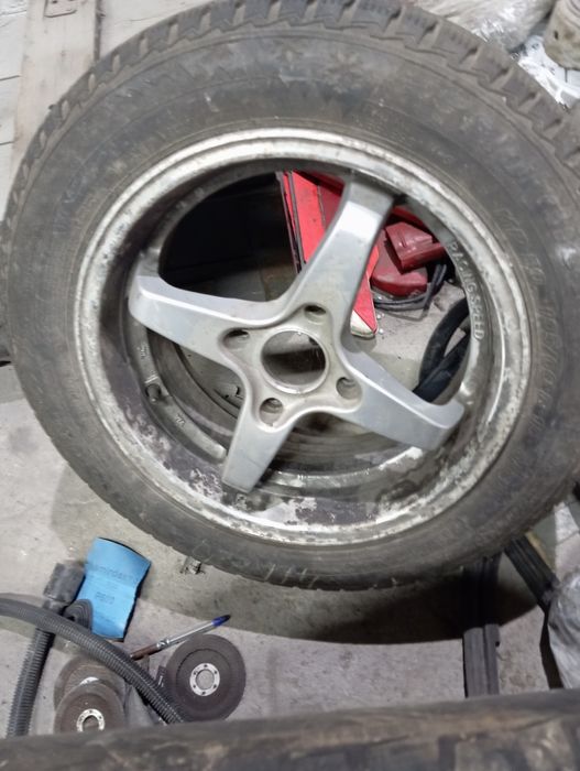 Диск Таврия ,ваз,Опель,Митсубиси,форд фиеста . Колпаки 15 .запаска