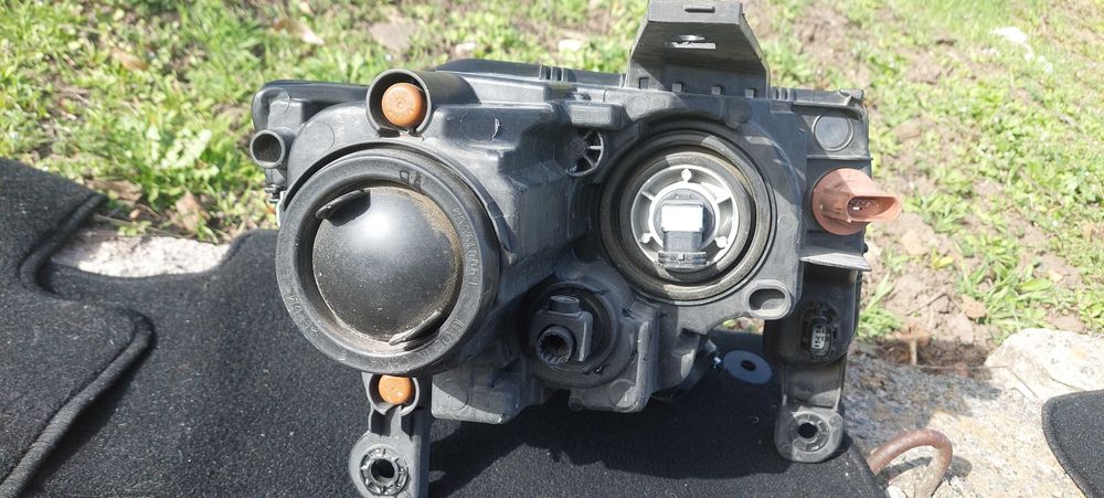 Фара Гранд Черокі ліва з рамкою ПТФ