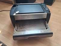 Grill elektryczny DeLonghi BQ100 2 ruszty niedymiący solidny 1600W