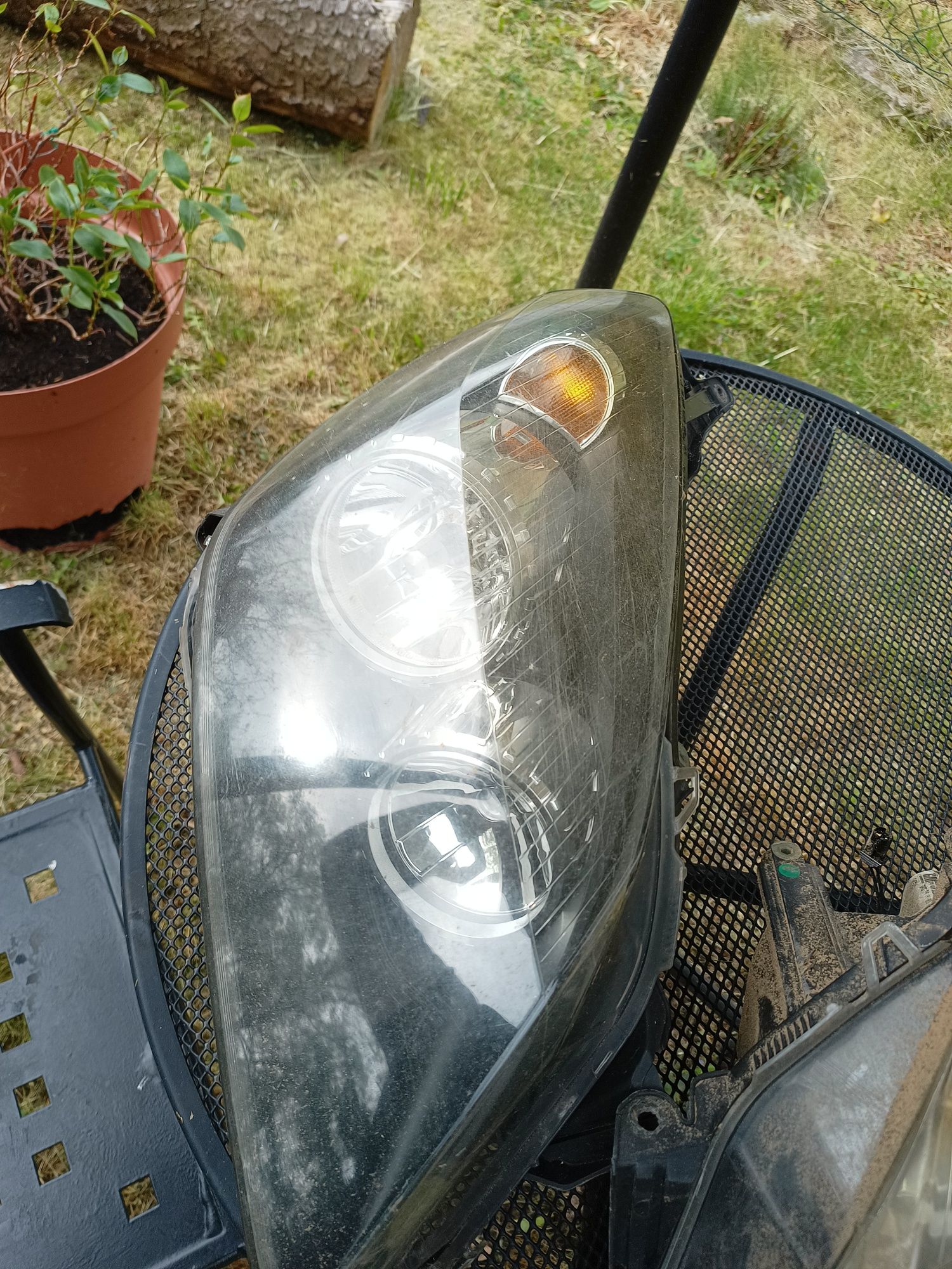 Lampy przód opel astra h