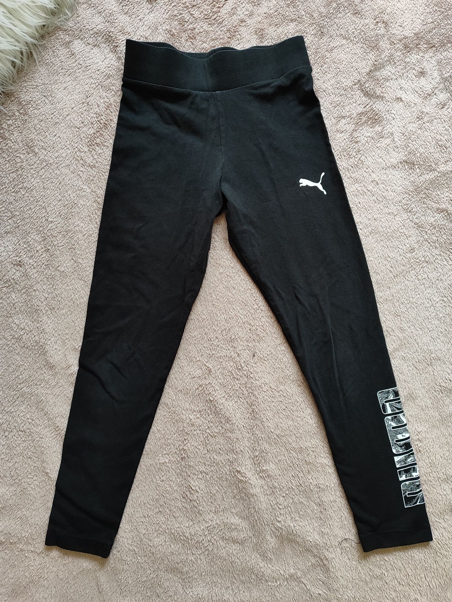 Czarne legginsy Puma rozmiar 140 (9-10 lat)