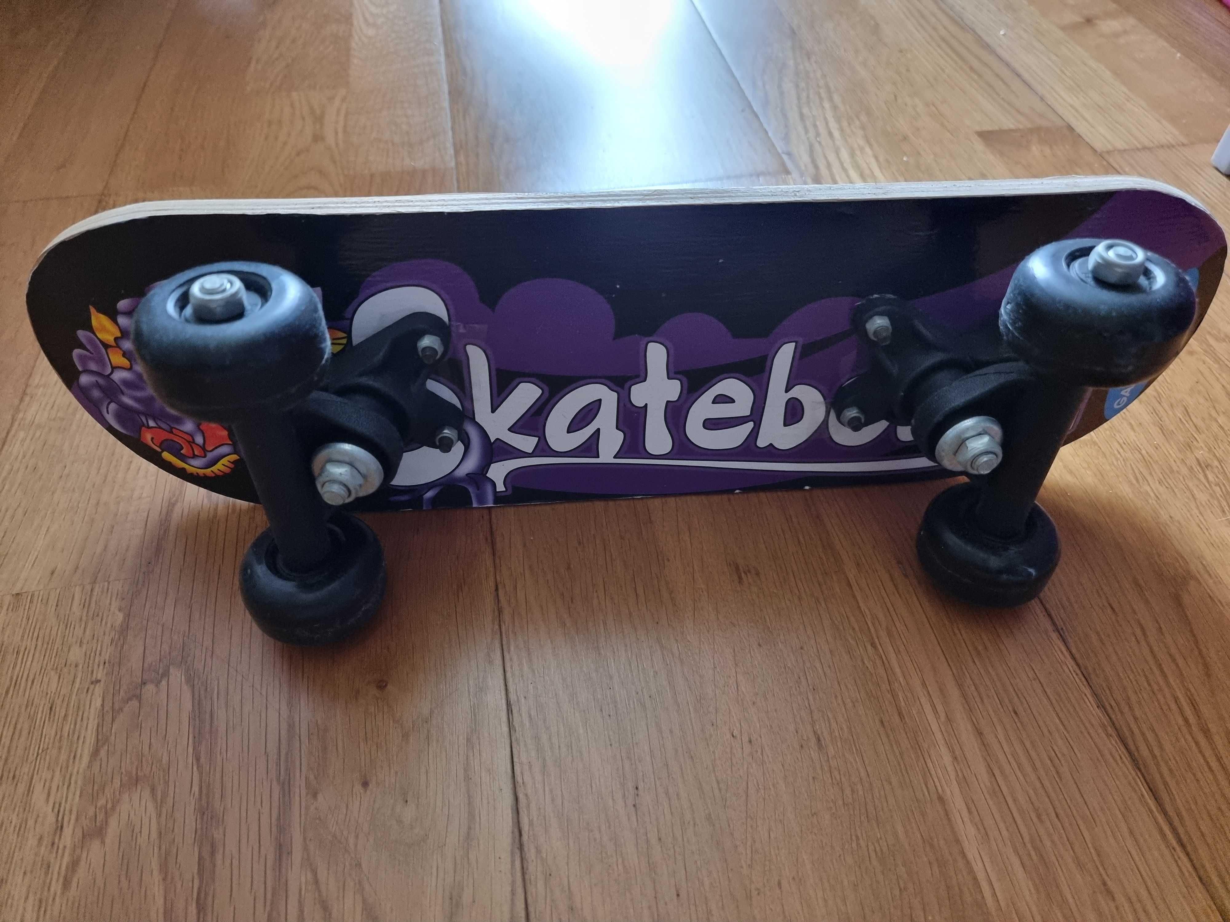 Vendo Skate "Gamausa.com" para criança  (44 x 13cm)