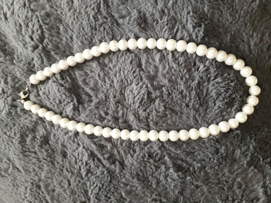 Буси браслети кулони