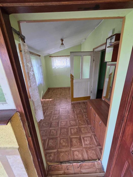 Sprzedam dom drewniano-murowany 60m2, działka 23,59a.