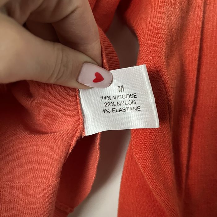 pomarańczowy krótki sweterek sweter crop top linea