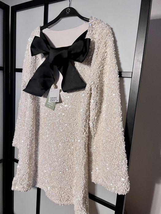 Viralowa sukienka H&M S cekiny cekinowa biała kokarda