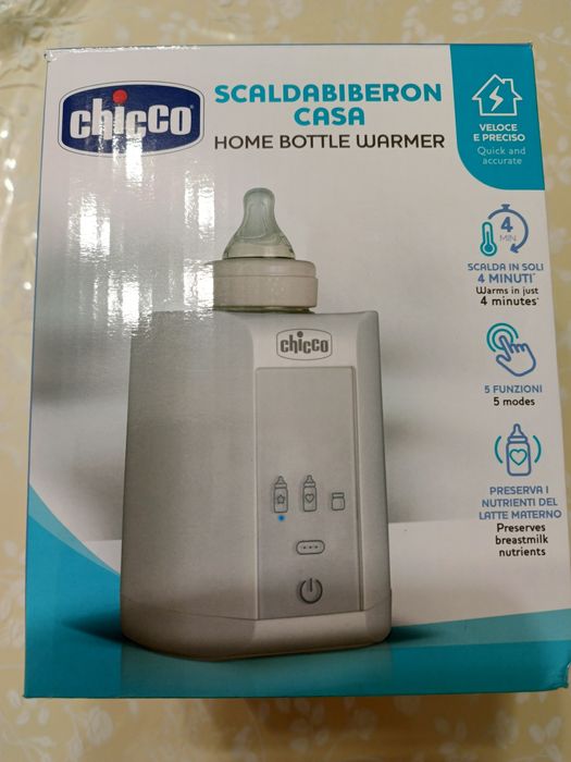 Підігрівач пляшечок Chicco.