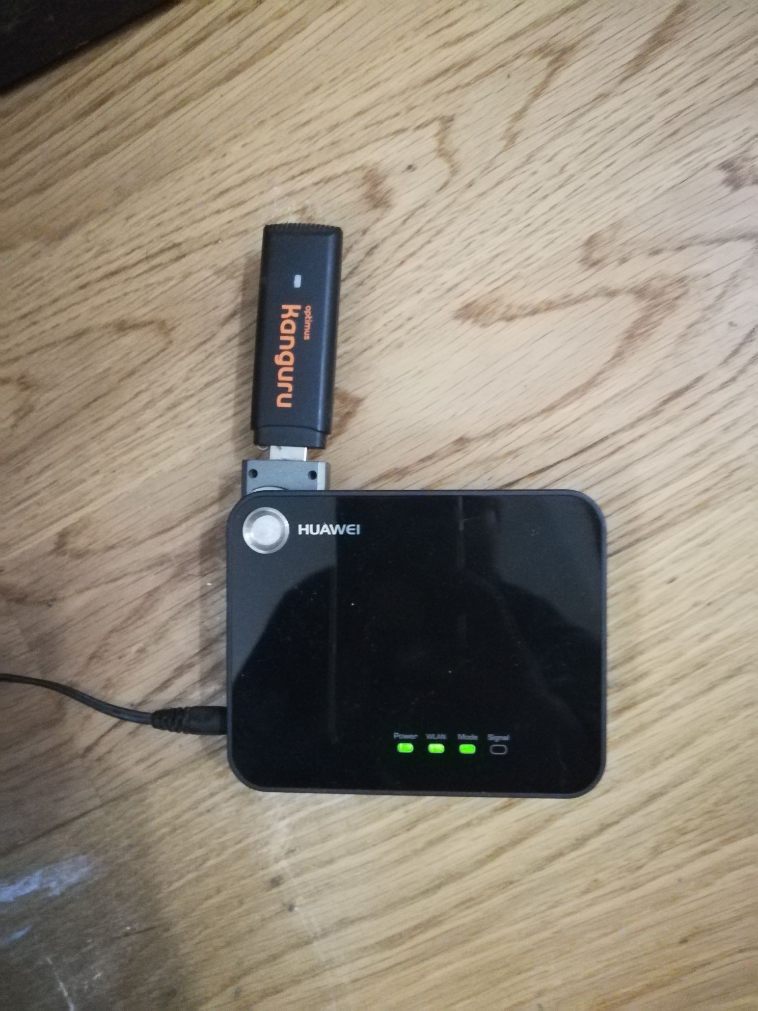 Router movel com pen e adaptador Ethernet