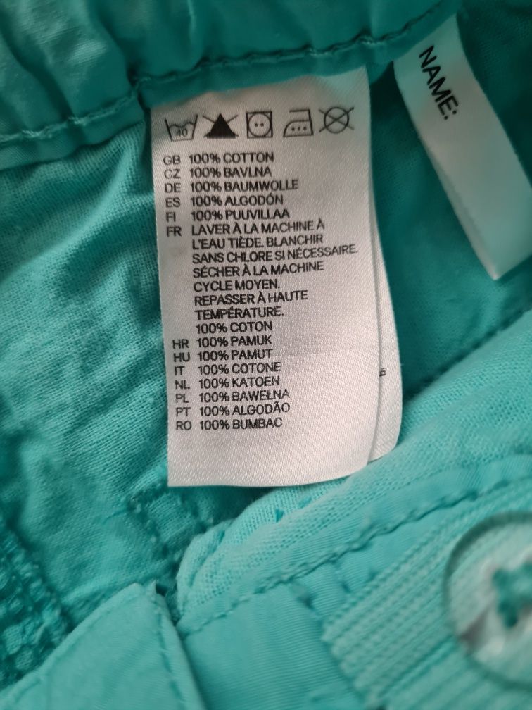Nowe H&M krótkie spodenki bawełna rozm 110 zielony