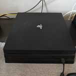 PS4 Pro 1 TB 2 pady