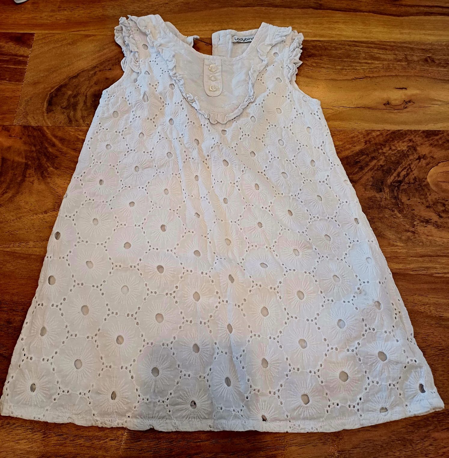 Sukienka biała dla dziewczynki 104-110cm Ladybird
